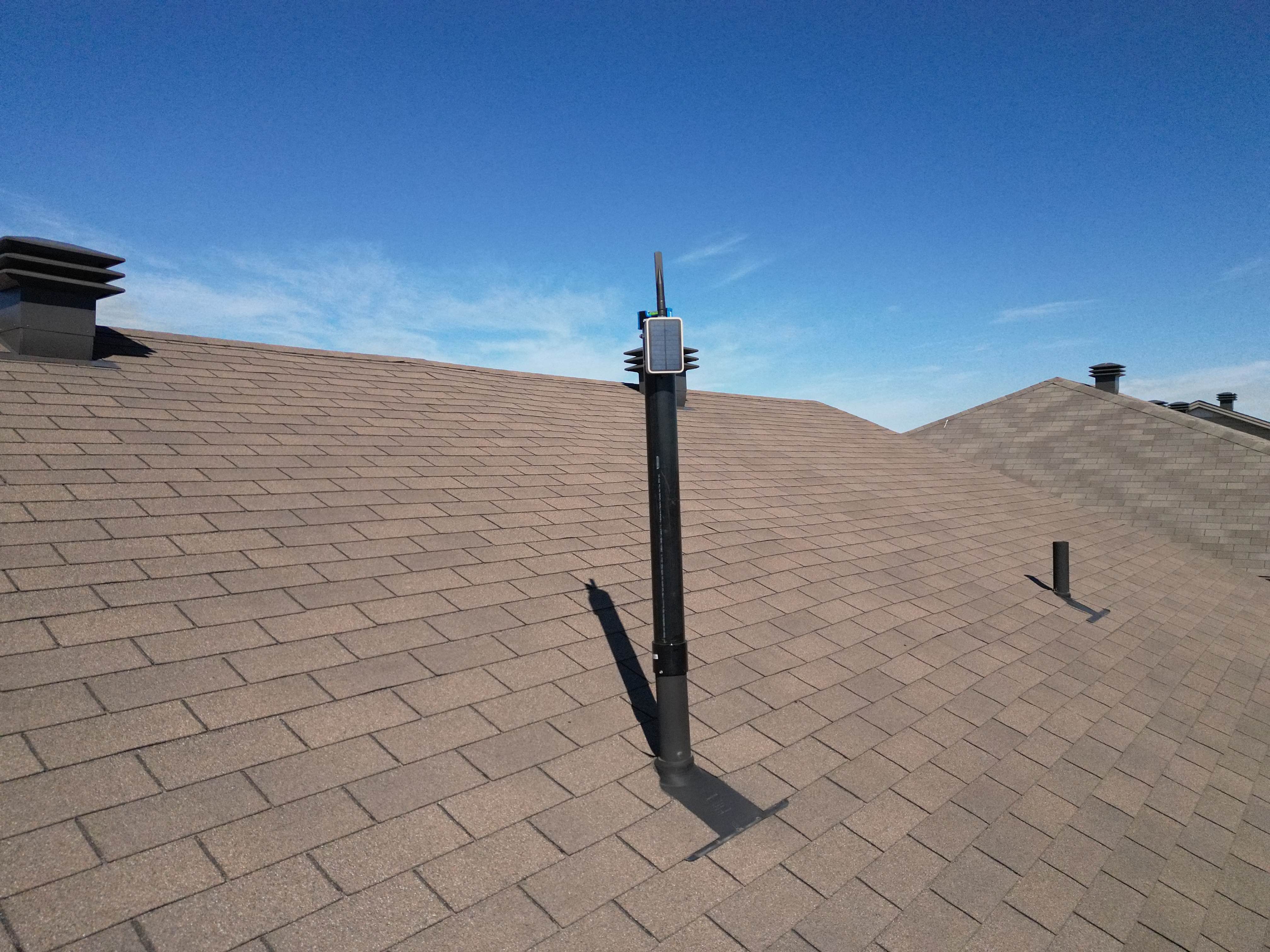 A community example of a repeater mounted on an ABS vent-pipe extension