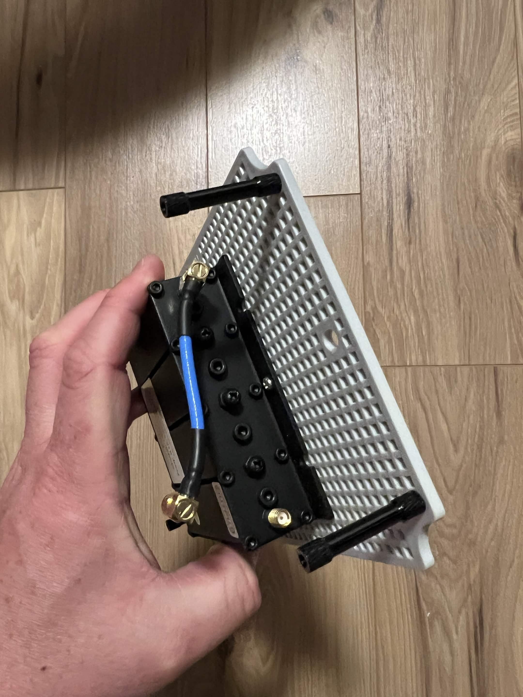 Mounting plate with spacers and RF filter