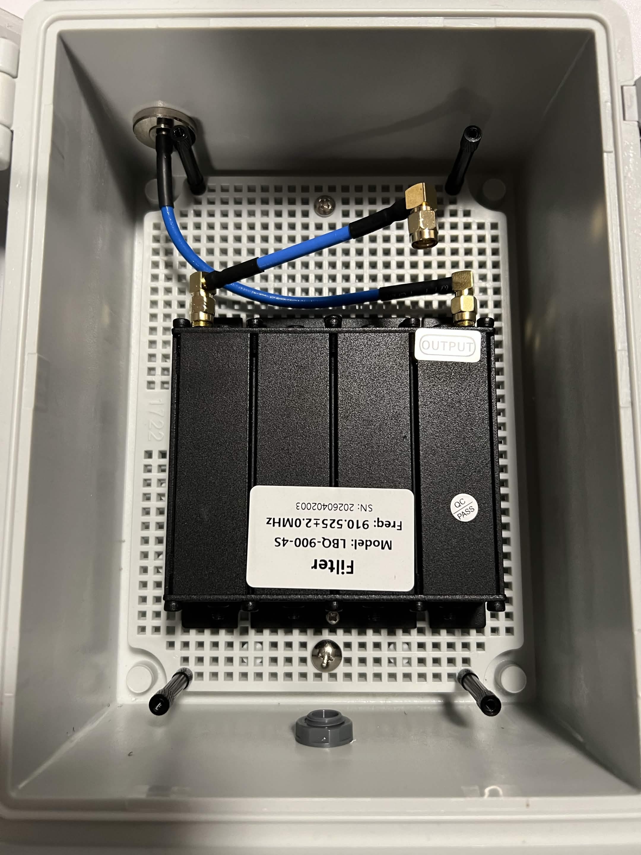 Enclosure with filter, RF bulkhead cables, and vent plug