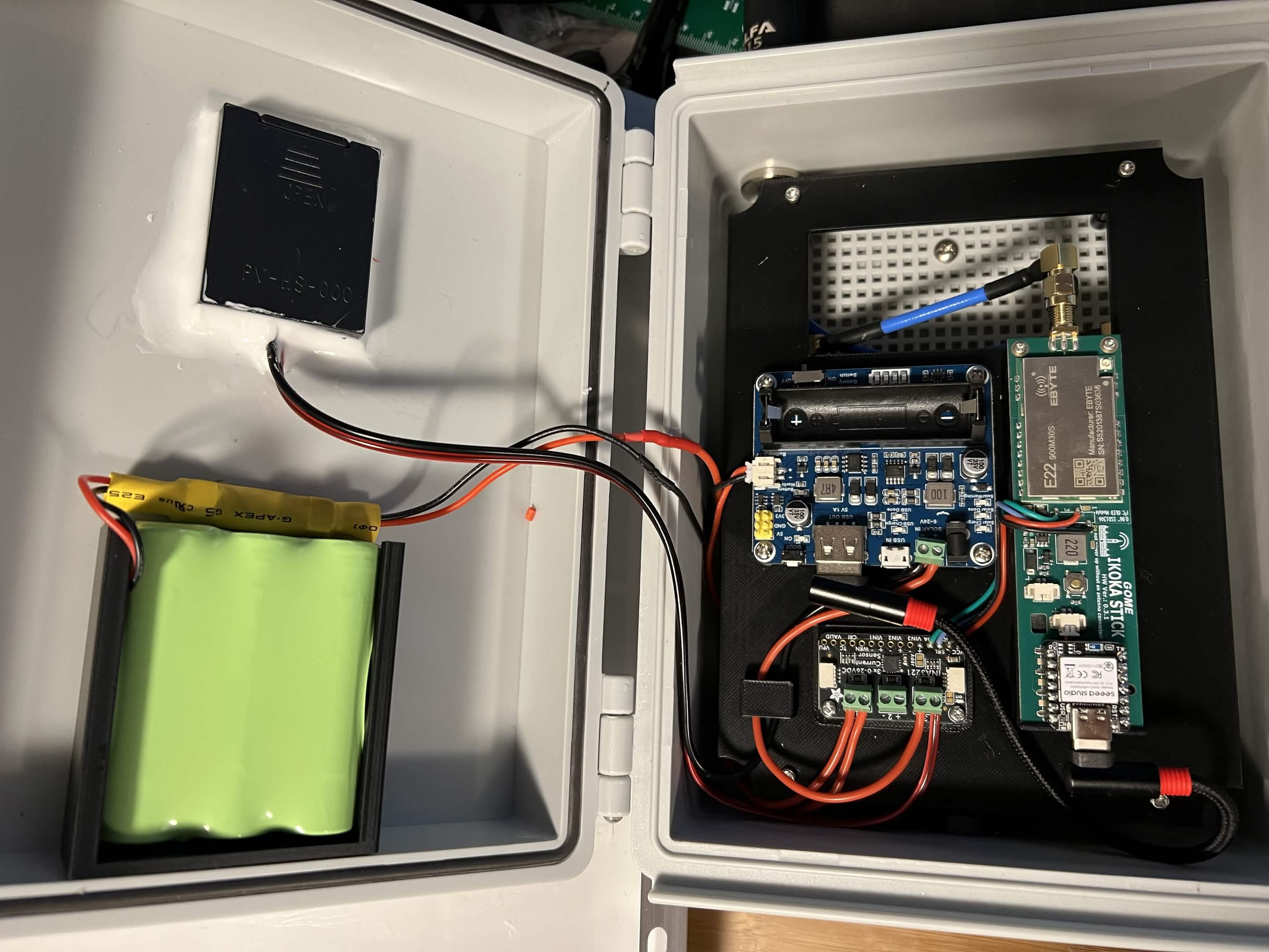 Full enclosure interior with radio, filter, power manager, and battery